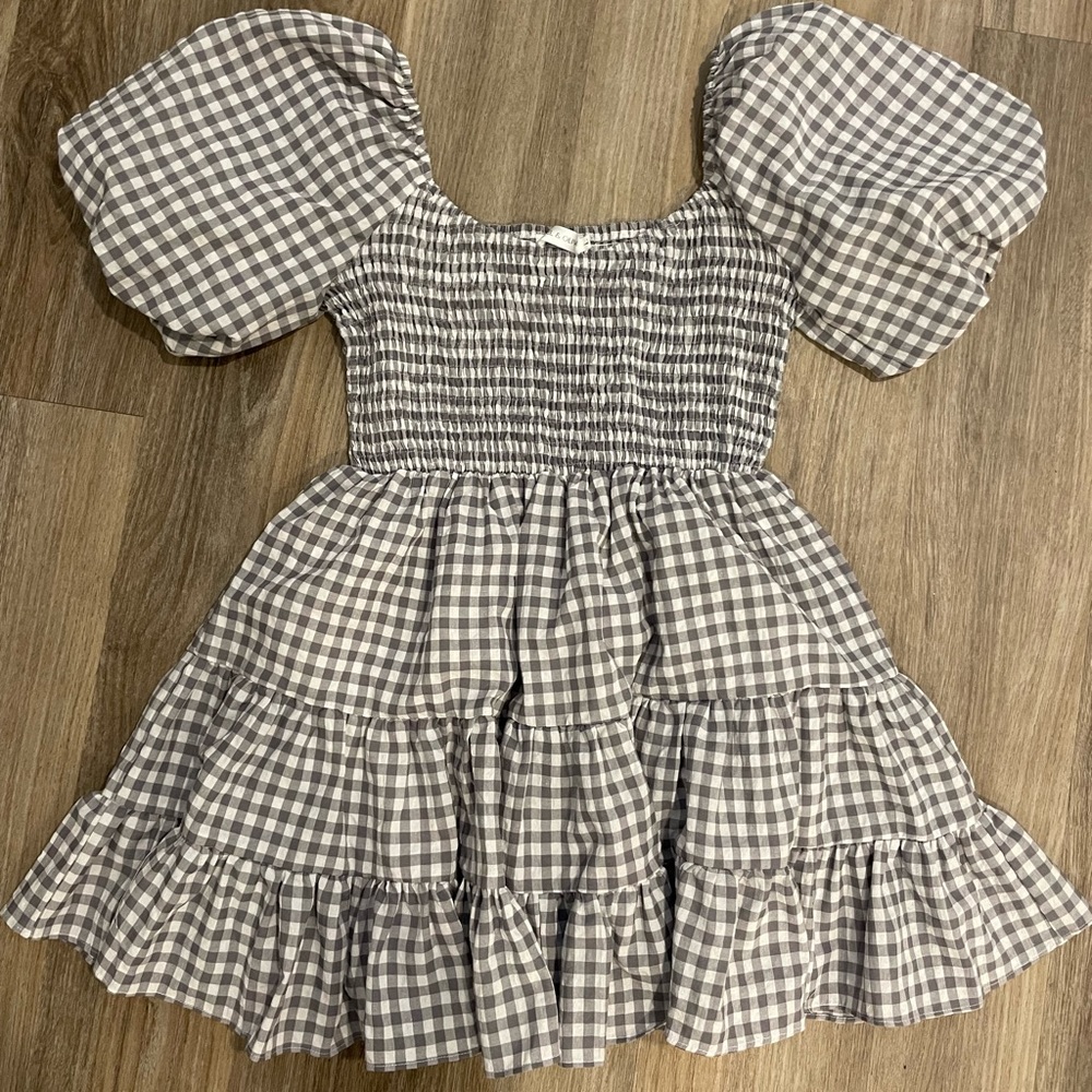 Gray and white plaid dress. Puff sleeves.